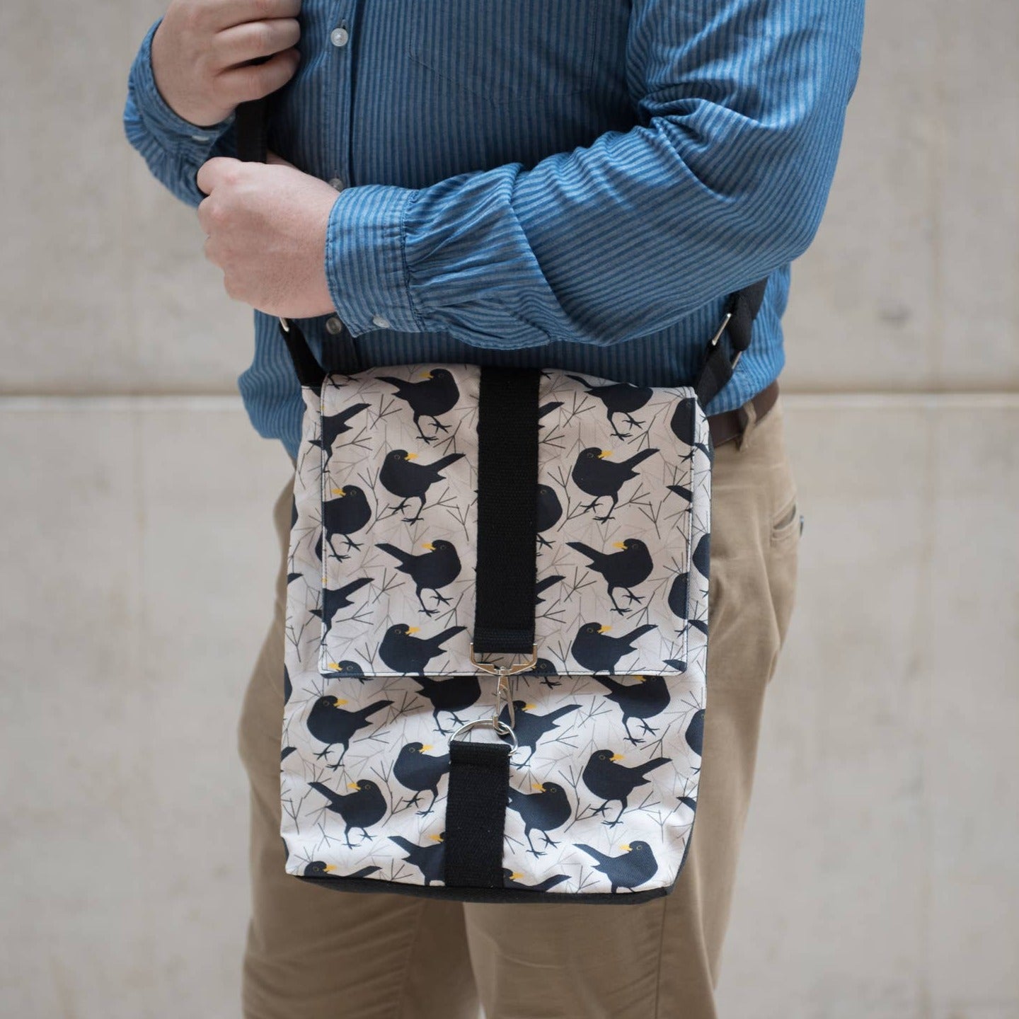 Blackbird print messenger bag