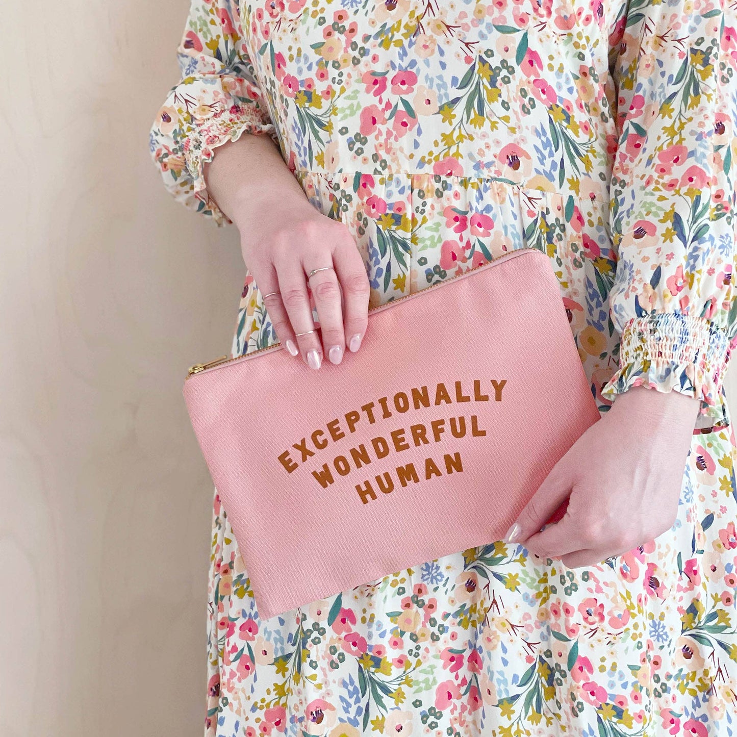 Exceptionally Wonderful Human blush pink zip purse