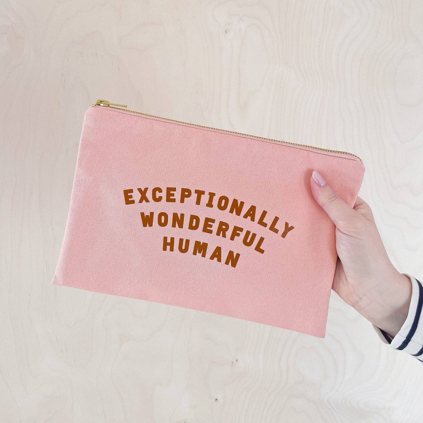 Exceptionally Wonderful Human blush pink zip purse