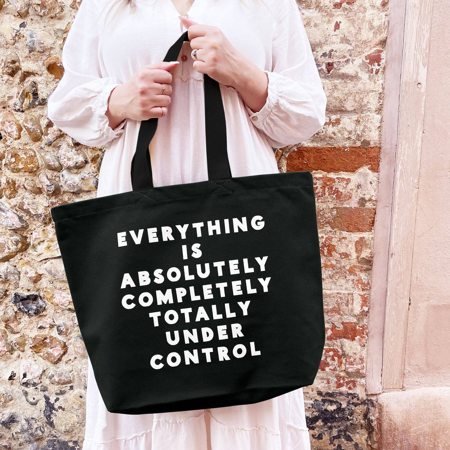 Everything is Under Control black canvas tote bag