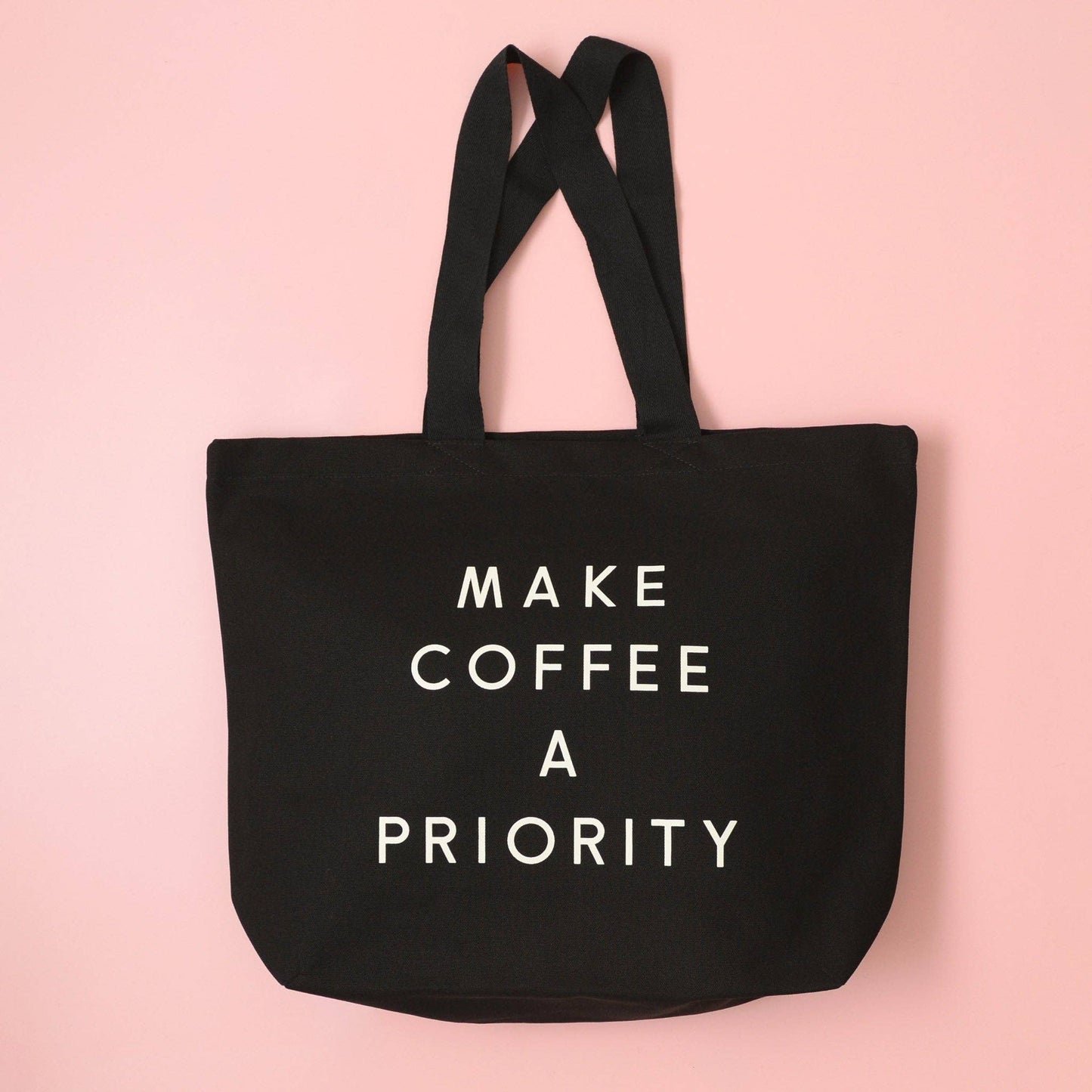 Make coffee a priority - black canvas tote bag