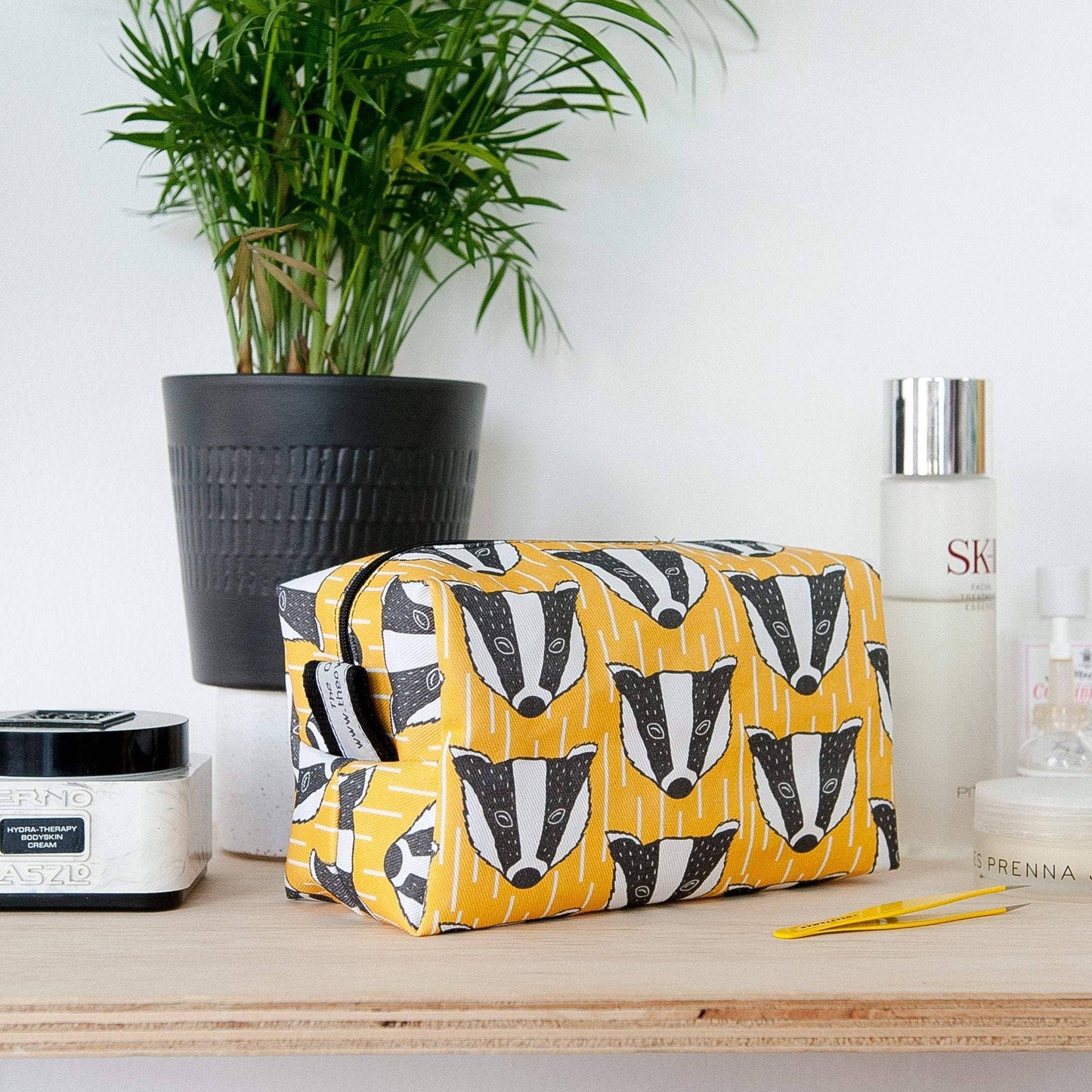 Yellow badger print washbag