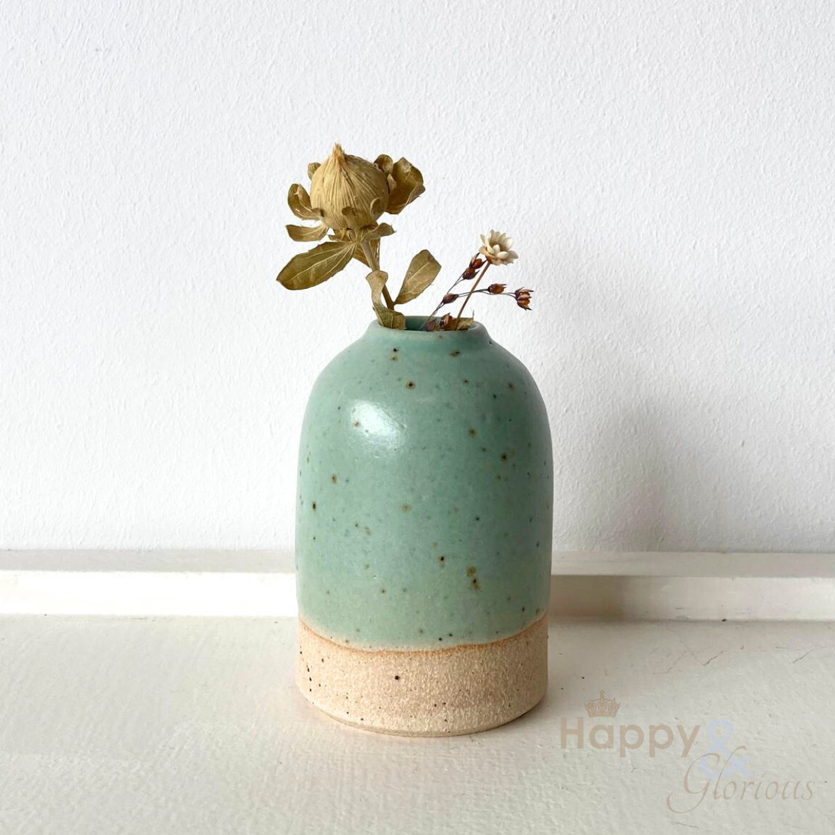 Small mint green stoneware bud vase