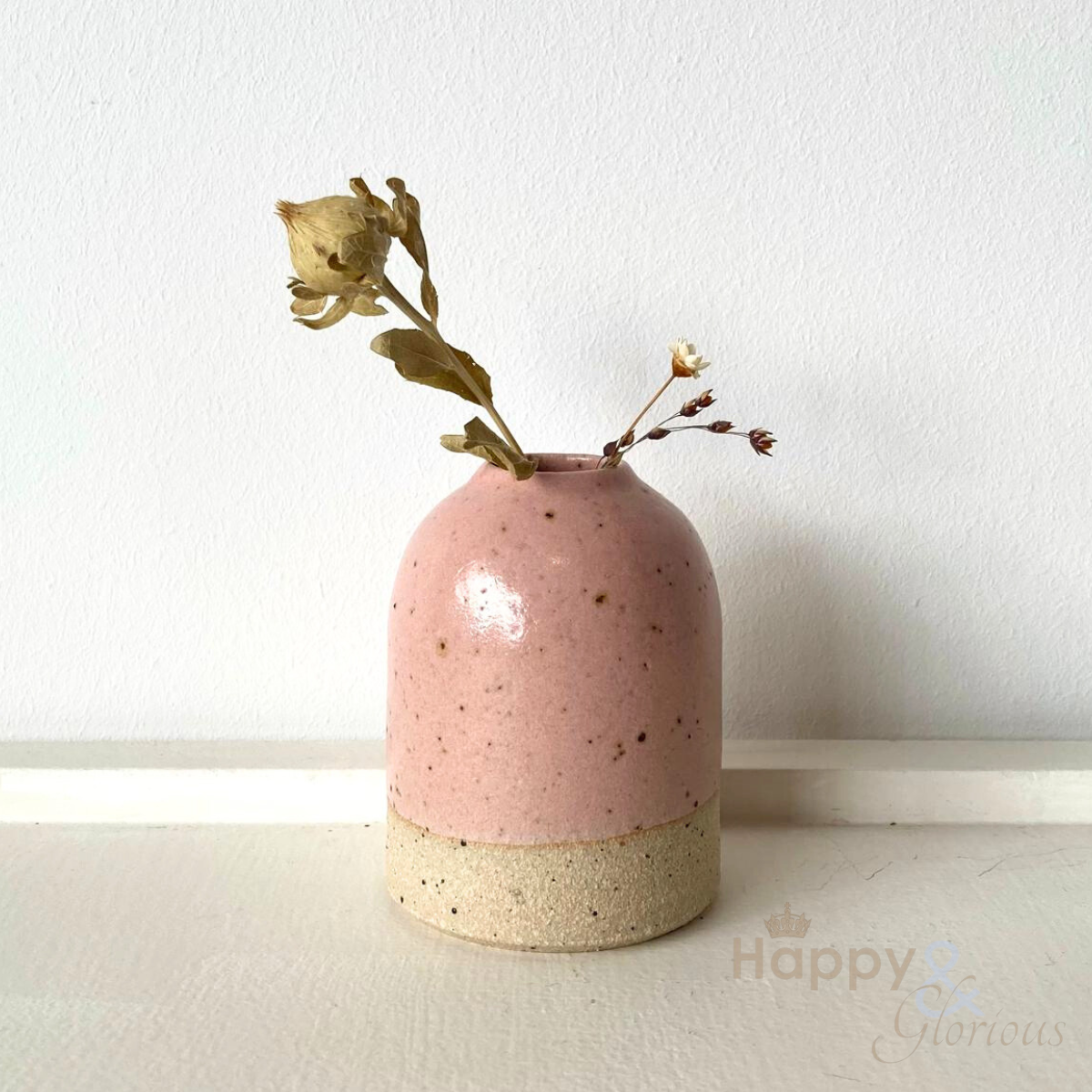 Small pale pink stoneware bud vase