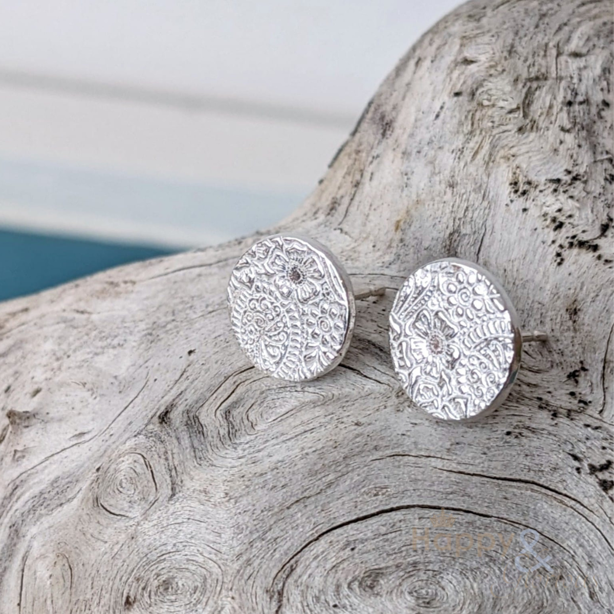 Sterling silver textured circle stud earrings