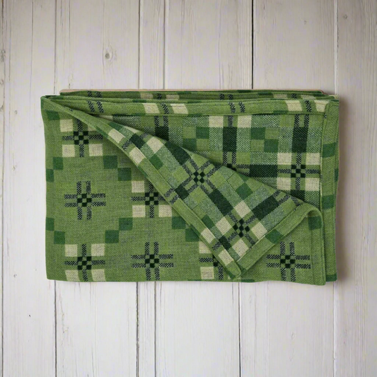 Deilen green St Davids Cross pure lambswool throw by Melin Tregwynt