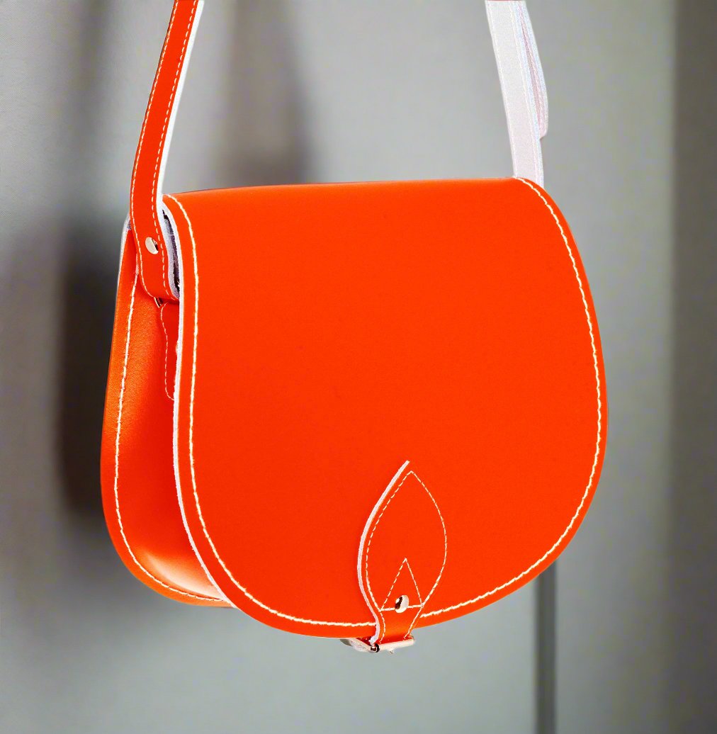 Orange handmade leather saddle bag