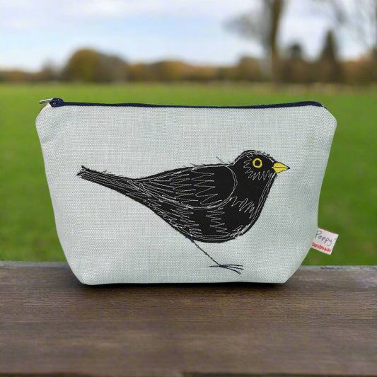 Blackbird embroidered make up bag