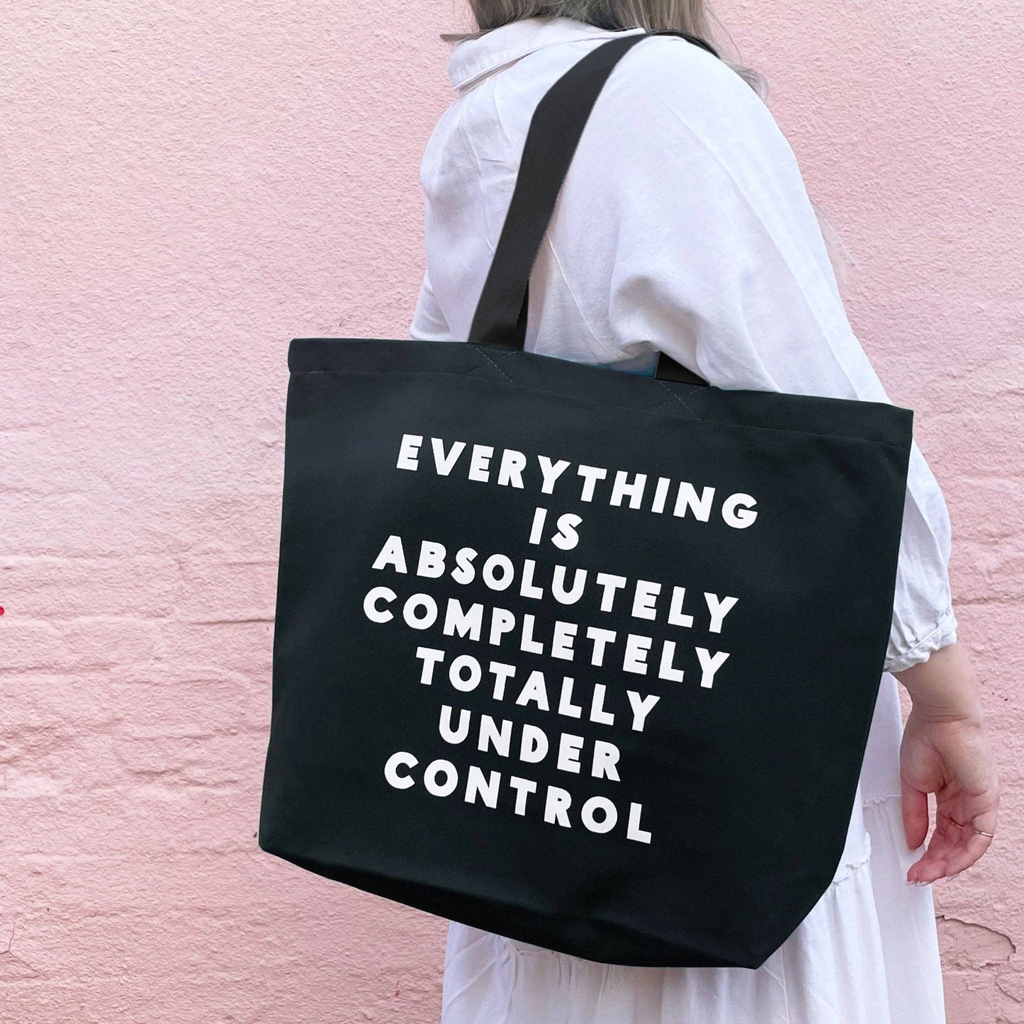 Everything is Under Control black canvas tote bag