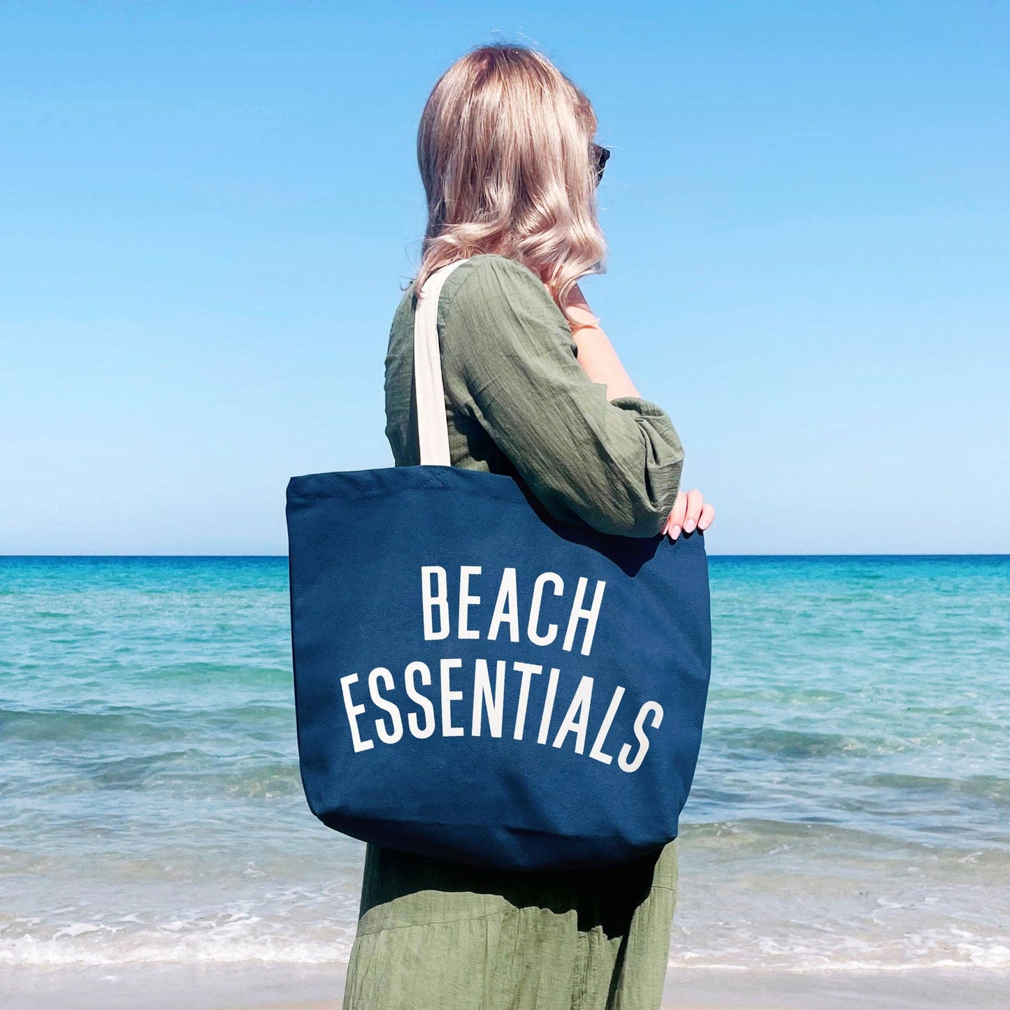 Ocean blue beach essentials canvas tote bag