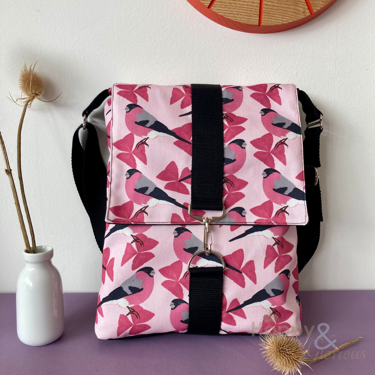 Pink bullfinch print messenger bag