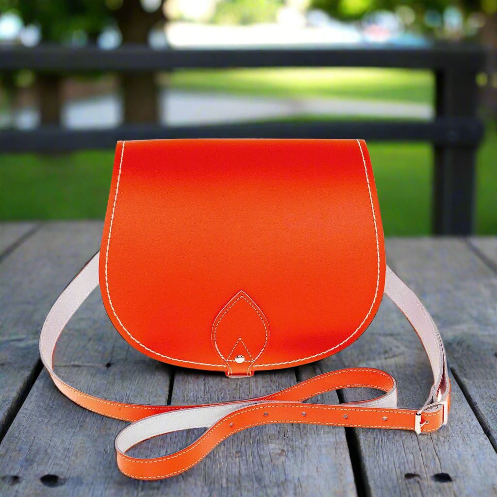 Orange handmade leather saddle bag