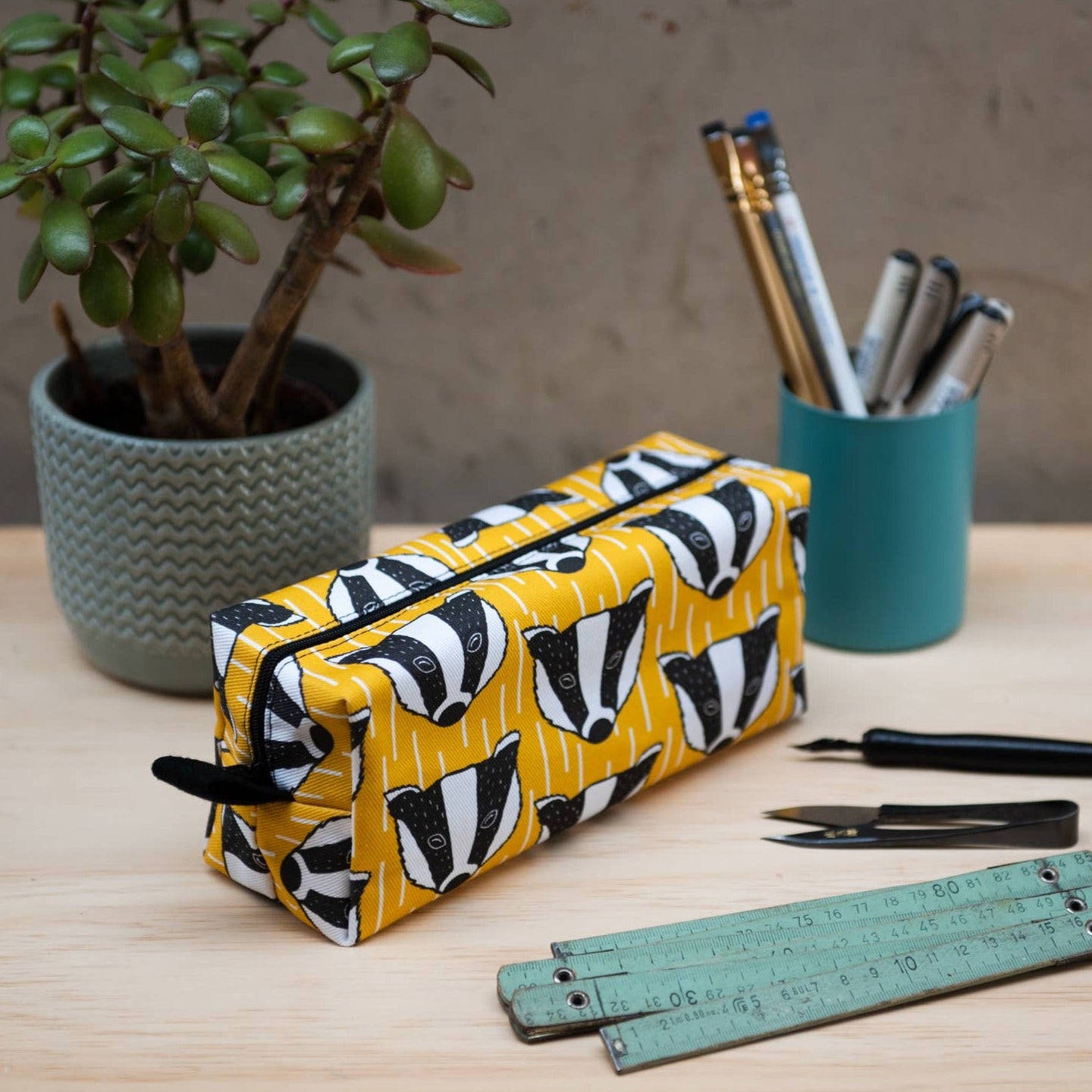 Yellow badger print pencil case