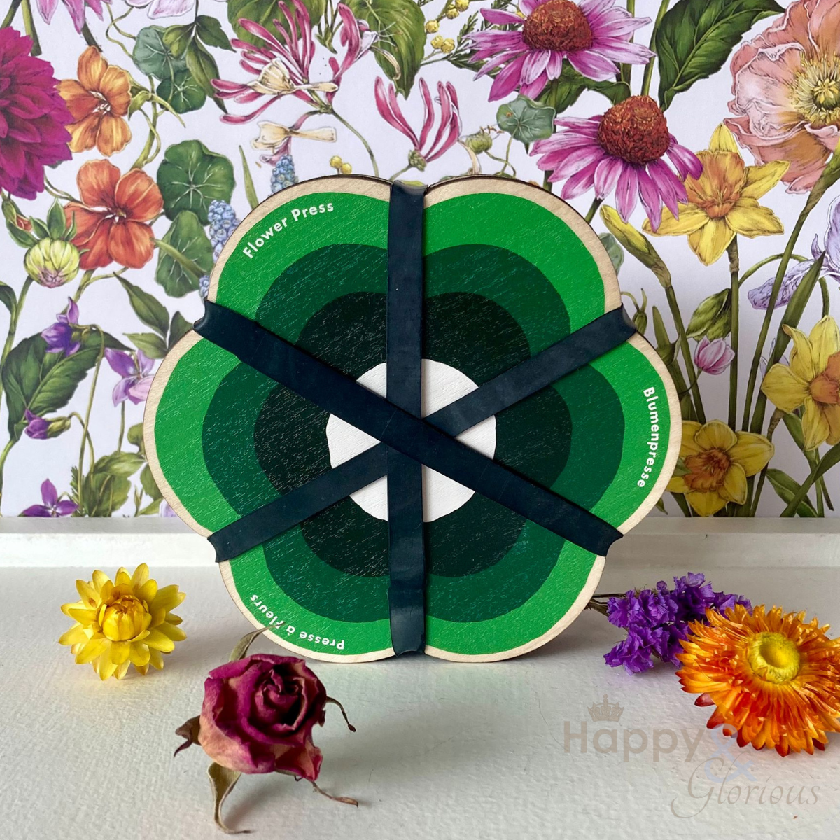 Green flower-shaped flower press