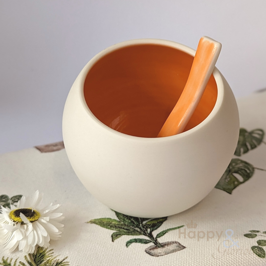 Orange porcelain salt pig & spoon